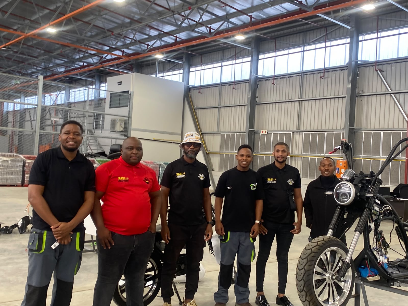 Delivery partners with electric bikes at the IDZ facility